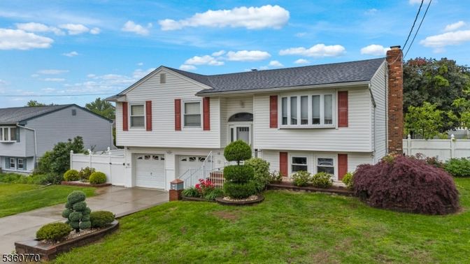 Attached, Exterior, Facade, Raised Ranch