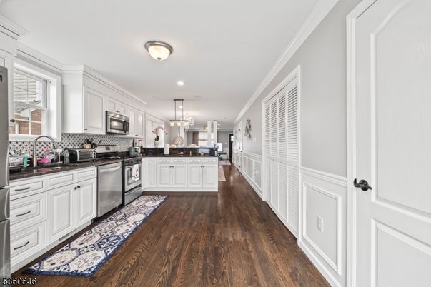 Chandelier, Interior, Kitchen, Recessed Lighting, Stainless Steel Appliances, Wood Texture Flooring