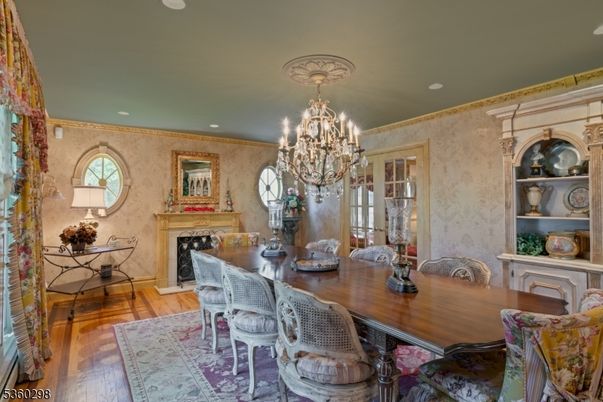 Chandelier, Dining room, Fireplace, Interior, Recessed Lighting, Wood Texture Flooring