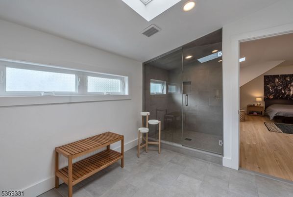 Bathroom, Bedroom, Glass Shower, Interior, Recessed Lighting, Wood Texture Flooring