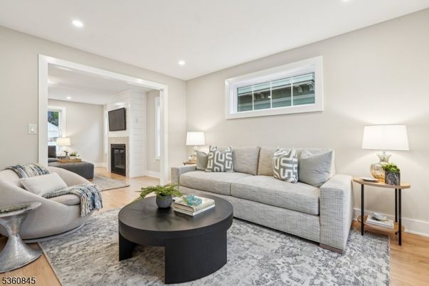 Fireplace, Interior, Living room, Recessed Lighting, Wood Texture Flooring