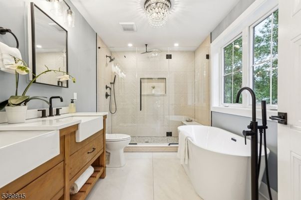 Bathroom, Chandelier, Free Standing Baths, Glass Shower, Interior, Recessed Lighting