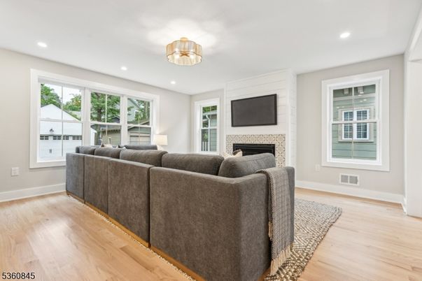 Fireplace, Interior, Living room, Recessed Lighting, Wood Texture Flooring