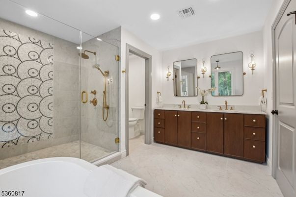 Bathroom, Dual Sink Vanities, Glass Shower, Interior, Marble, Marble Walls, Recessed Lighting