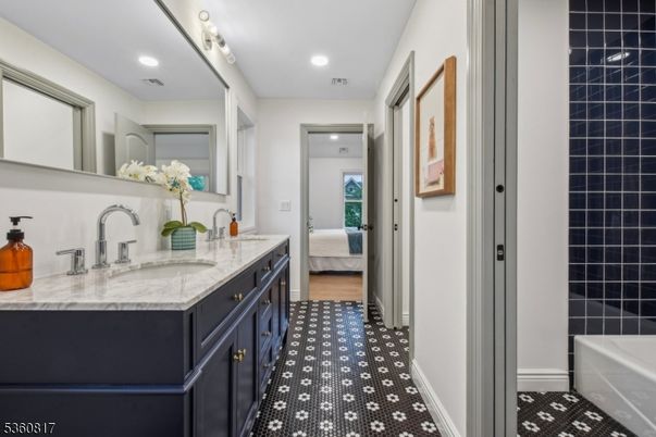 Bathroom, Bedroom, Dual Sink Vanities, Interior, Recessed Lighting, Wood Texture Flooring