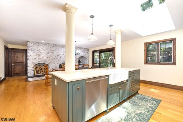 Fireplace, Interior, Kitchen, Pendant Lights, Recessed Lighting, Stone Walls, Wood Texture Flooring
