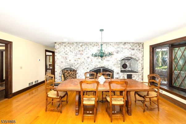 Chandelier, Dining room, Fireplace, Interior, Wood Texture Flooring