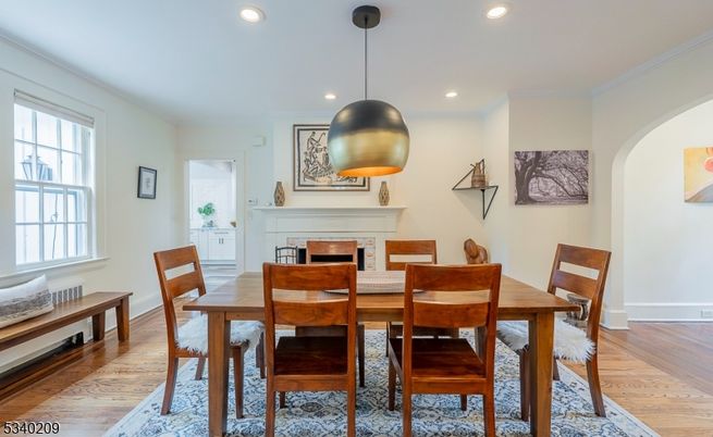 Dining room, Fireplace, Interior, Pendant Lights, Recessed Lighting, Wood Texture Flooring