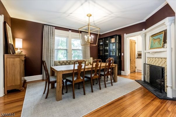 Dining room, Fireplace, Interior, Pendant Lights, Wood Texture Flooring