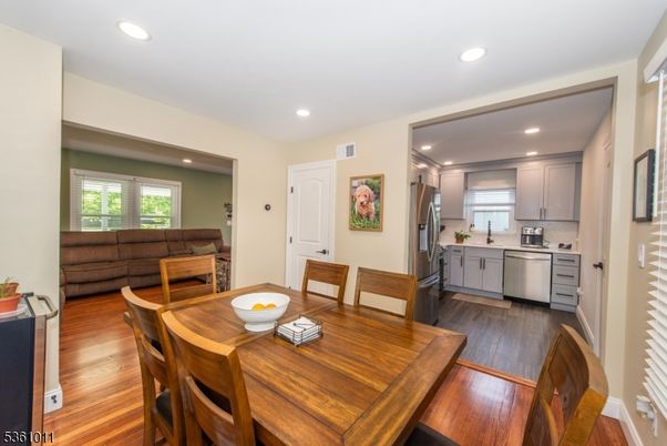 Dining room, Interior, Kitchen, Recessed Lighting, Stainless Steel Appliances, Wood Texture Flooring