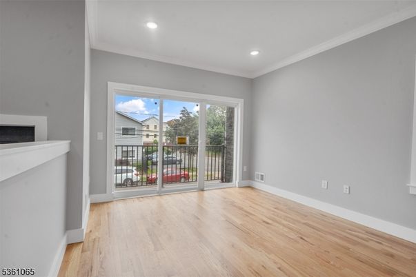 Empty room, Fireplace, Interior, Recessed Lighting, Wood Texture Flooring