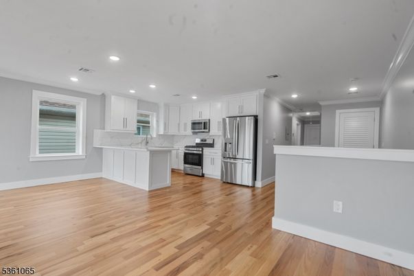 Interior, Kitchen, Recessed Lighting, Stainless Steel Appliances, Wood Texture Flooring