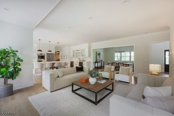 Dining room, Interior, Kitchen, Living room, Pendant Lights, Recessed Lighting, Stainless Steel Appliances, Wood Texture Flooring