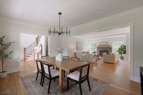 Dining room, Fireplace, Interior, Living room, Pendant Lights, Recessed Lighting, Wood Texture Flooring