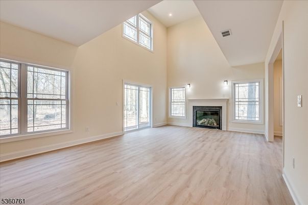 Empty room, Fireplace, Interior, Recessed Lighting, Wood Texture Flooring