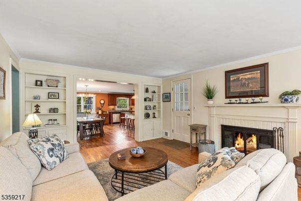 Chandelier, Dining room, Fireplace, Interior, Living room, Pendant Lights, Wood Texture Flooring