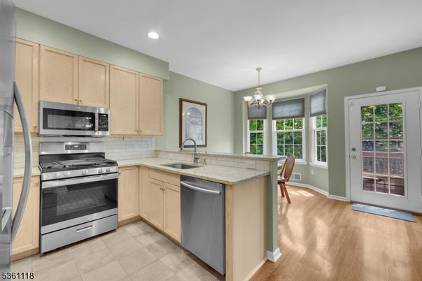 Chandelier, Interior, Kitchen, Recessed Lighting, Stainless Steel Appliances, Wood Texture Flooring
