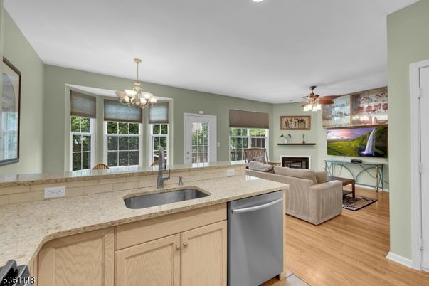 Chandelier, Dining room, Interior, Kitchen, Living room, Recessed Lighting, Wood Texture Flooring