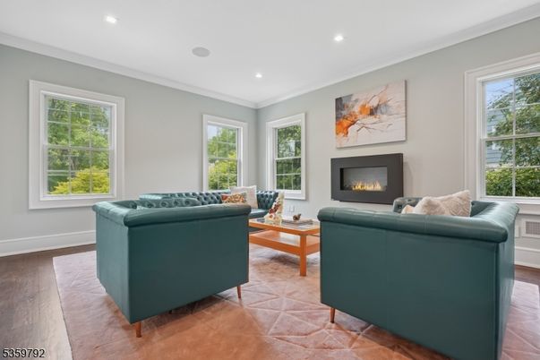 Fireplace, Interior, Living room, Recessed Lighting, Wood Texture Flooring