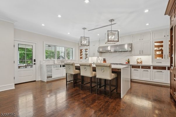 Interior, Kitchen, Marble Walls, Pendant Lights, Recessed Lighting, Wood Texture Flooring
