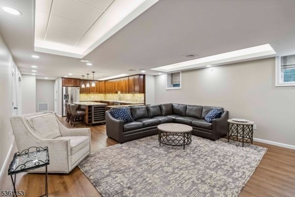 Dining room, Interior, Kitchen, Living room, Pendant Lights, Recessed Lighting, Stainless Steel Appliances, Wood Texture Flooring