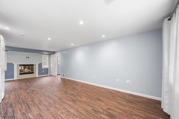 Empty room, Fireplace, Interior, Recessed Lighting, Wood Texture Flooring