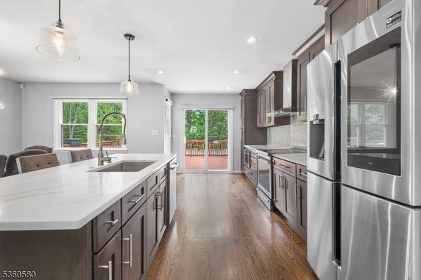 Interior, Kitchen, Pendant Lights, Recessed Lighting, Stainless Steel Appliances, Wood Texture Flooring