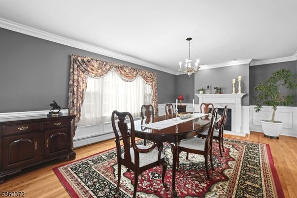 Chandelier, Dining room, Fireplace, Interior, Wood Texture Flooring
