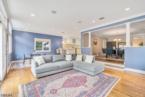 Chandelier, Dining room, Interior, Kitchen, Living room, Pendant Lights, Recessed Lighting, Wood Texture Flooring