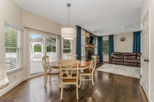 Dining room, Fireplace, Interior, Pendant Lights, Recessed Lighting, Wood Texture Flooring