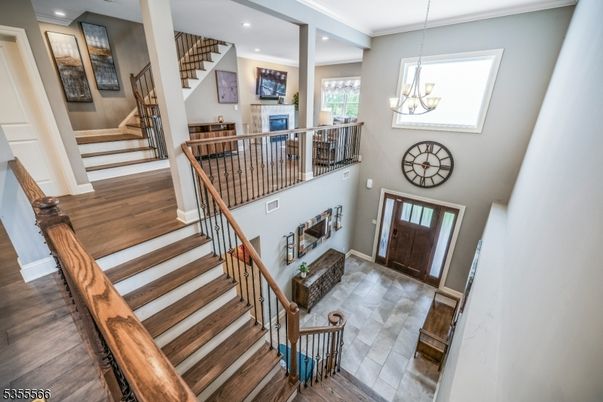 Chandelier, Fireplace, Interior, Recessed Lighting, Wood Texture Flooring