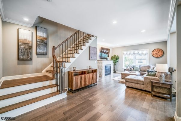 Fireplace, Interior, Living room, Recessed Lighting, Wood Texture Flooring
