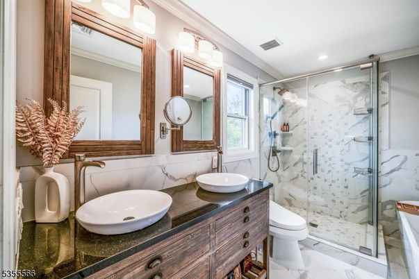 Bathroom, Dual Sink Vanities, Glass Shower, Interior, Marble, Marble Walls, Recessed Lighting