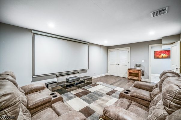 Interior, Projection Screen, Recessed Lighting, Theatre Room, Wood Texture Flooring