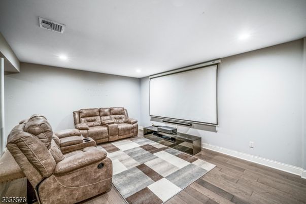 Interior, Projection Screen, Recessed Lighting, Theatre Room, Wood Texture Flooring