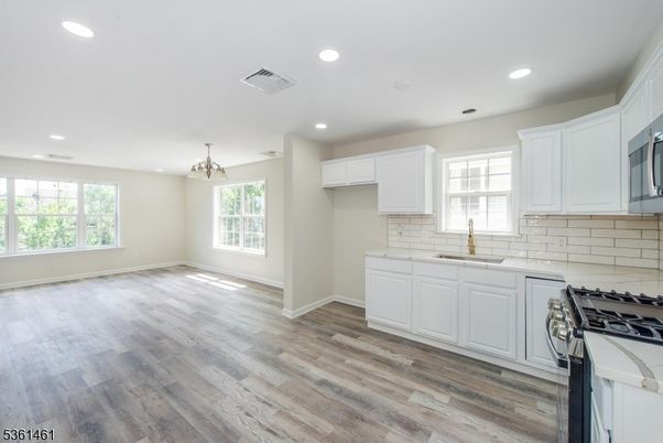 Chandelier, Empty room, Interior, Kitchen, Recessed Lighting, Wood Texture Flooring