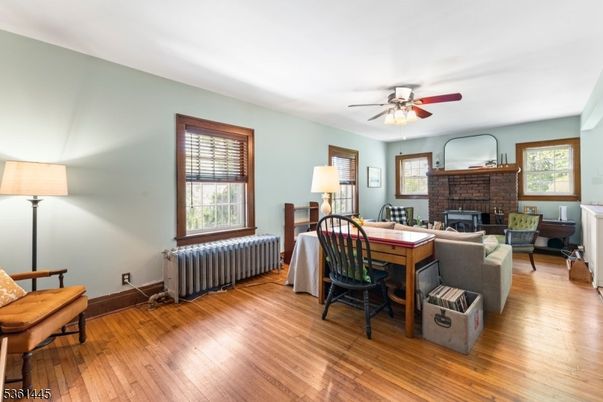 Dining room, Fireplace, Interior, Living room, Wood Texture Flooring