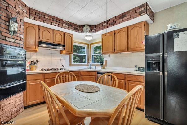 Dining room, Interior, Kitchen, Tile Countertops, Wood Texture Flooring