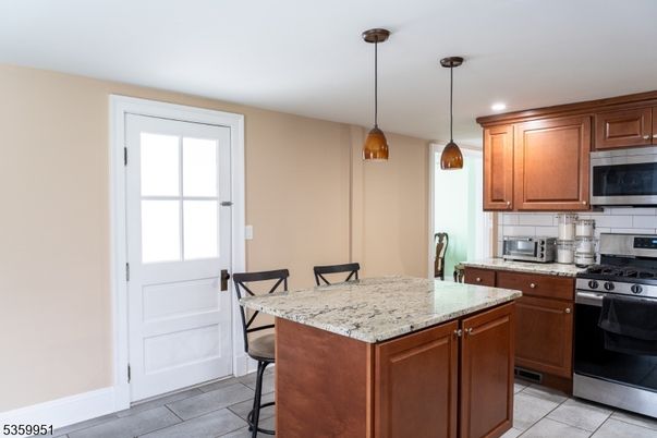 Dining room, Interior, Kitchen, Pendant Lights, Recessed Lighting, Stainless Steel Appliances