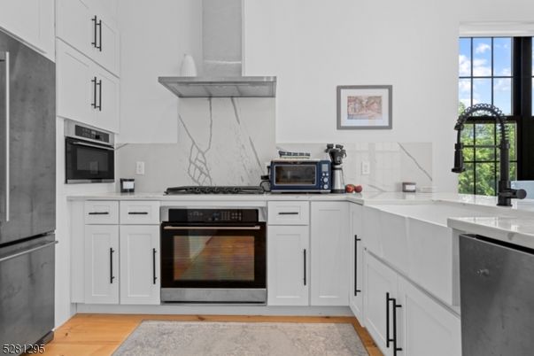 Interior, Kitchen, Marble Walls, Stainless Steel Appliances, Wood Texture Flooring