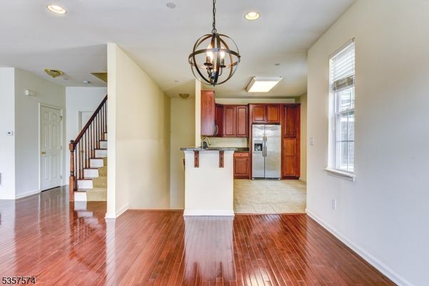 Chandelier, Interior, Kitchen, Recessed Lighting, Stainless Steel Appliances, Wood Texture Flooring