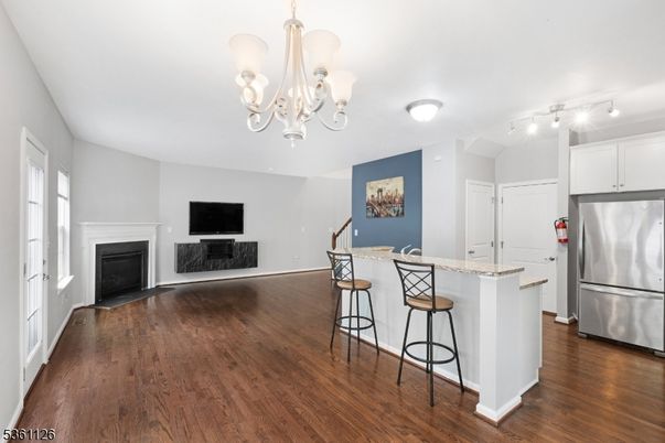Chandelier, Fireplace, Interior, Kitchen, Wood Texture Flooring