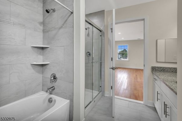 Bathroom, Glass Shower, Interior, Marble Walls, Recessed Lighting, Wood Texture Flooring