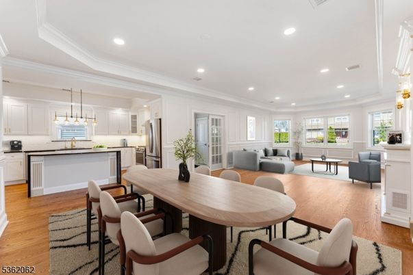 Dining room, Interior, Kitchen, Living room, Pendant Lights, Recessed Lighting, Stainless Steel Appliances, Wood Texture Flooring
