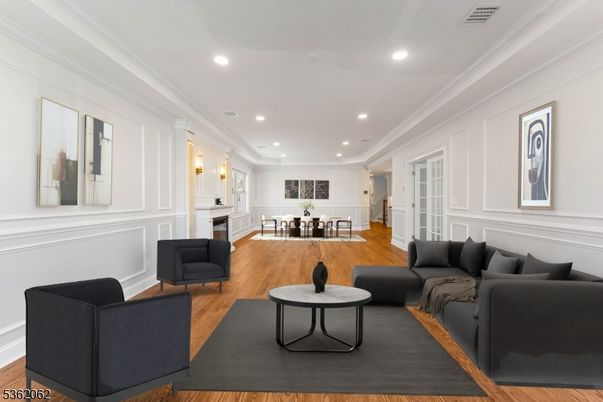 Dining room, Fireplace, Interior, Living room, Pendant Lights, Recessed Lighting, Wood Texture Flooring