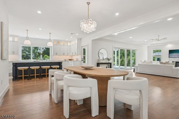 Chandelier, Dining room, Interior, Kitchen, Living room, Pendant Lights, Recessed Lighting, Wood Texture Flooring