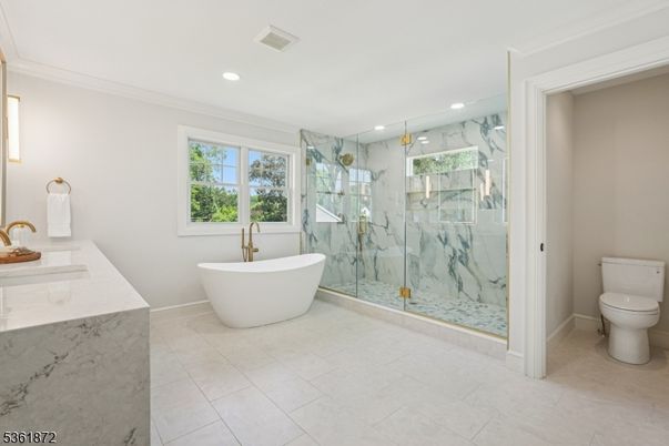 Bathroom, Free Standing Baths, Glass Shower, Interior, Marble Walls, Recessed Lighting