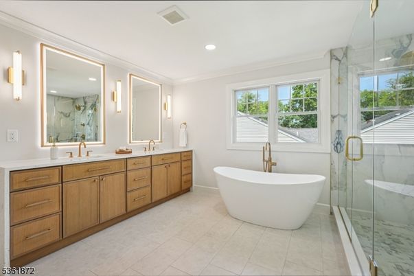 Bathroom, Dual Sink Vanities, Free Standing Baths, Glass Shower, Interior, Marble Walls, Recessed Lighting
