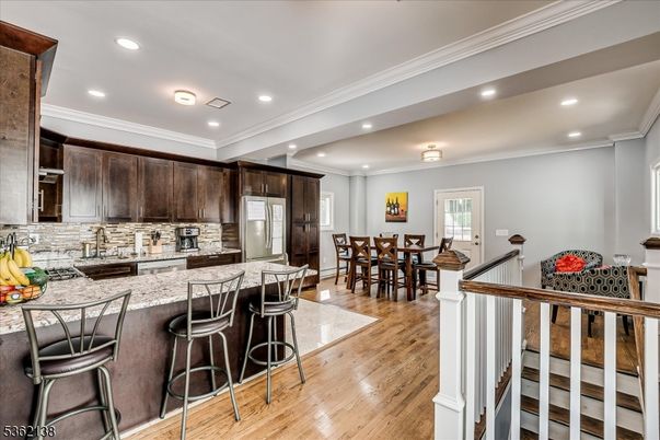 Dining room, Interior, Kitchen, Recessed Lighting, Stainless Steel Appliances, Wood Texture Flooring