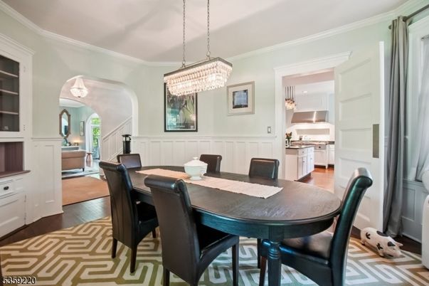 Chandelier, Dining room, Interior, Kitchen, Stainless Steel Appliances, Wood Texture Flooring